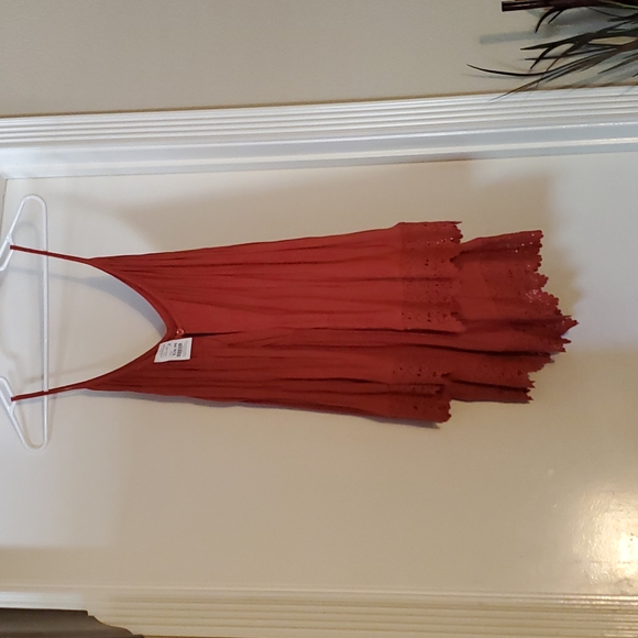 Burnt orange rompers with thick lace trim and button in back. - Picture 2 of 2